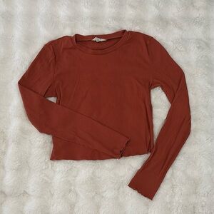 AERO Ribbed Lettuce Hem Long Sleeve Shrunken Tee Cropped Rust Terracotta
